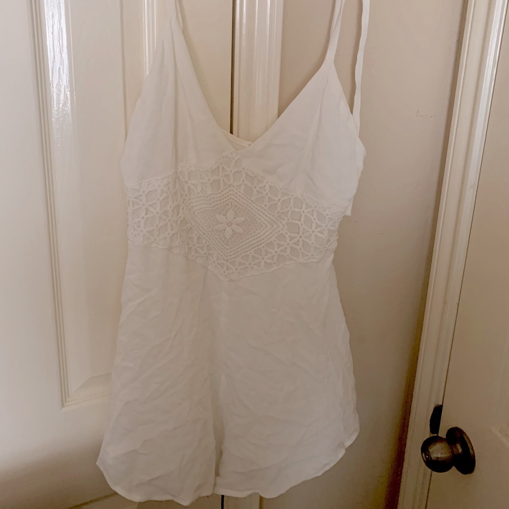 White romper, tie straps, front embroidery